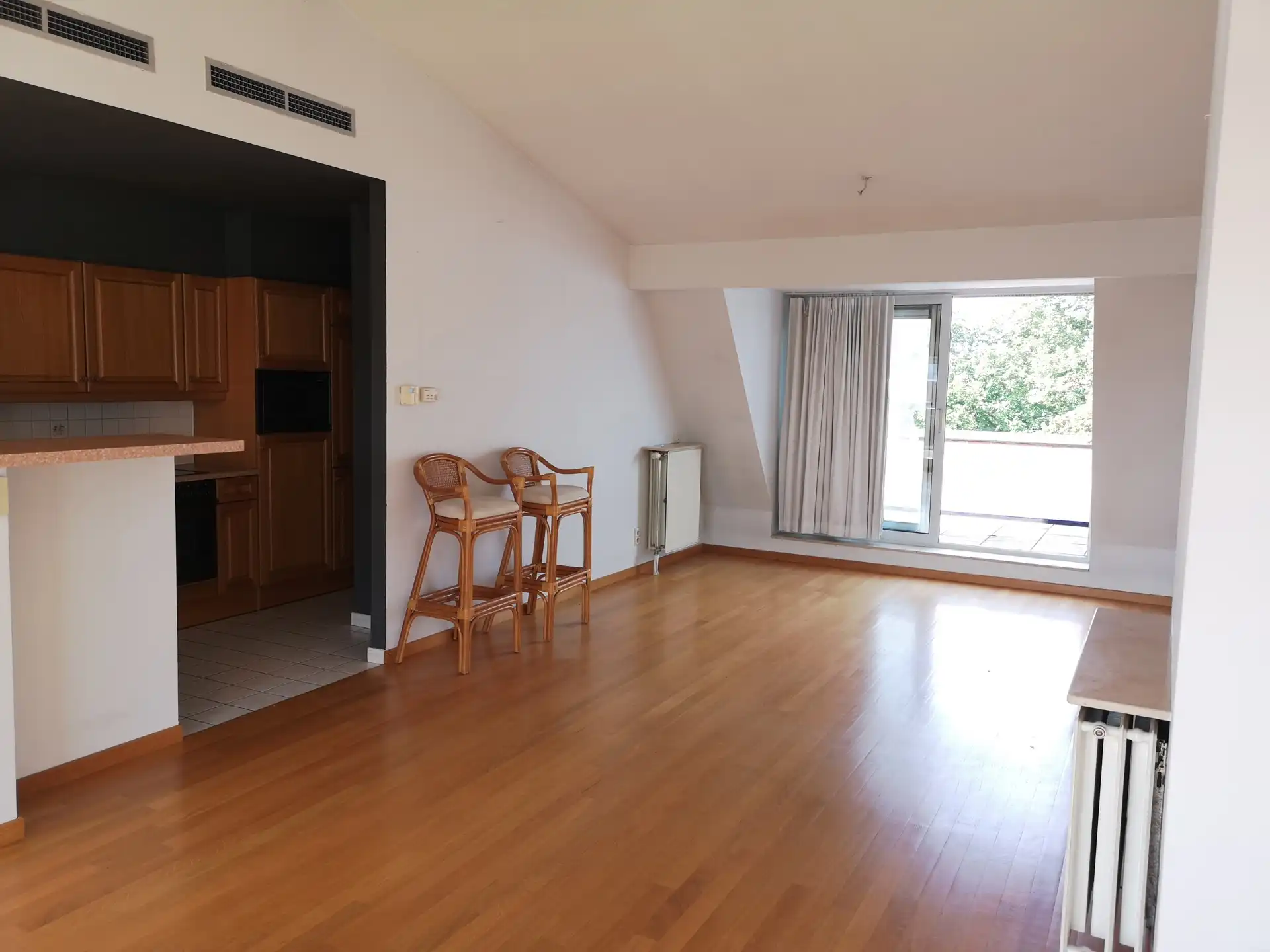 Duplex-appartement met twee terrassen en garagebox foto 2