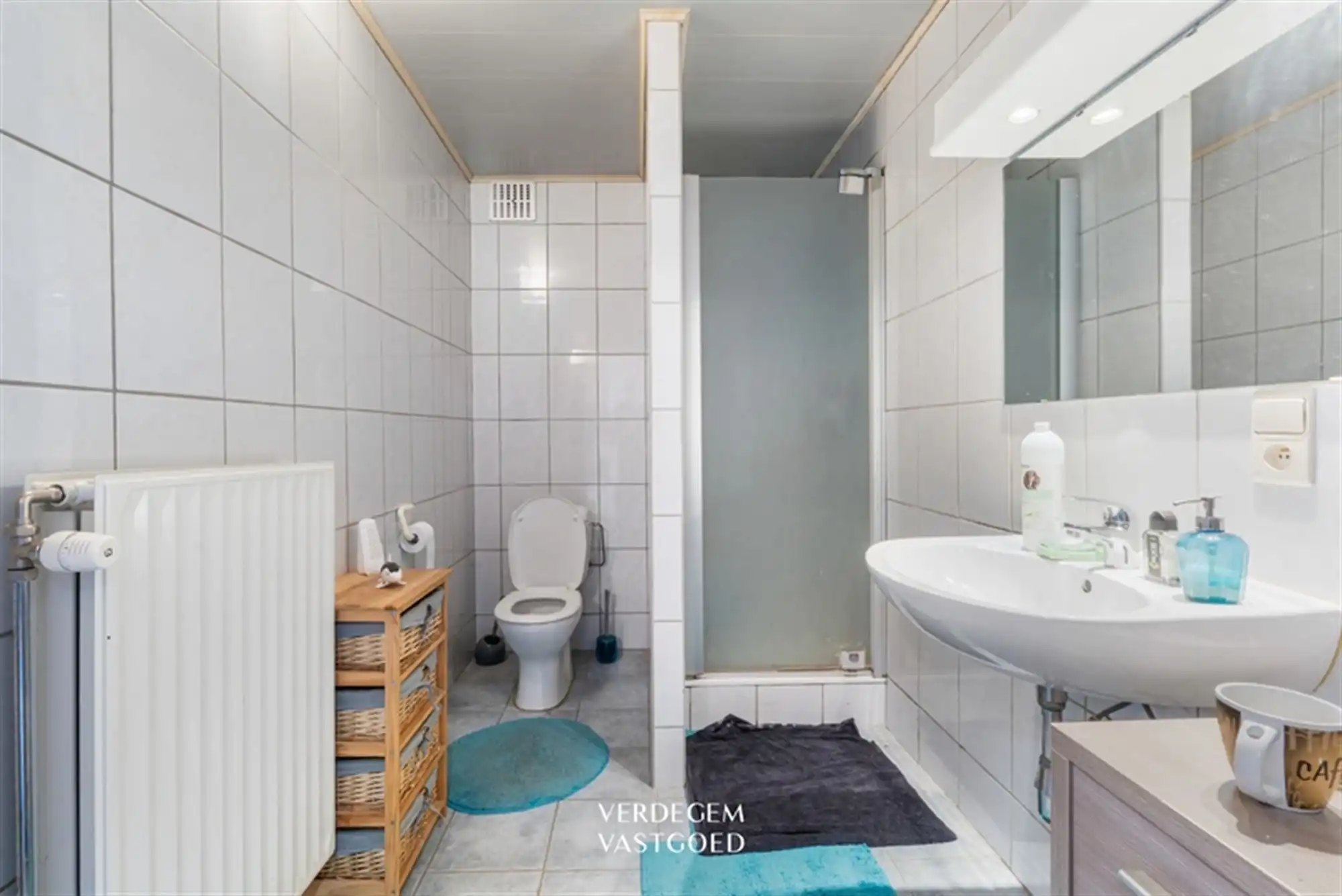 Opbrengsteigendom met 2 appartementen en 4 garages in het centrum van Sleidinge  foto 12