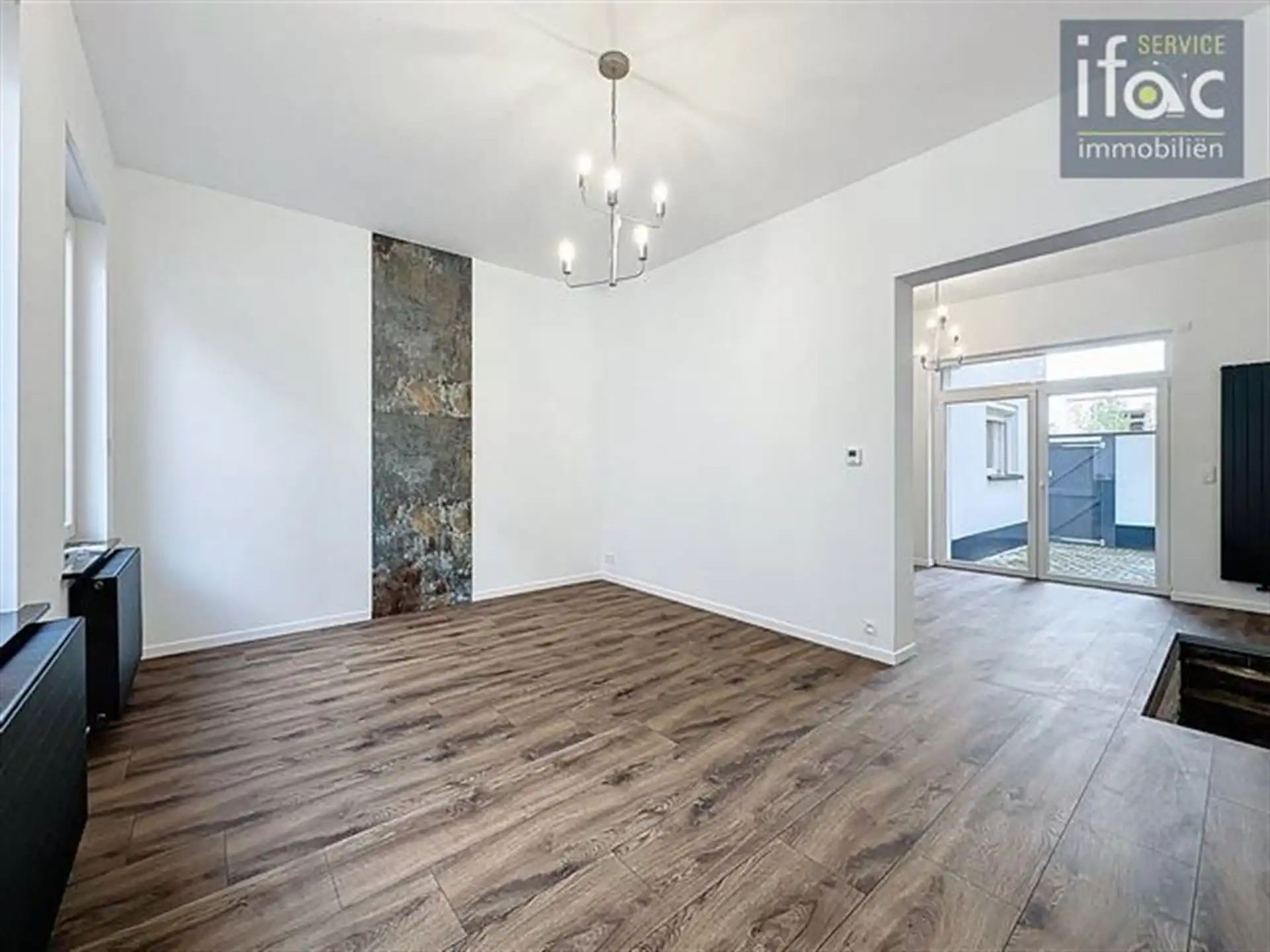 Gerenoveerde rijwoning foto 2