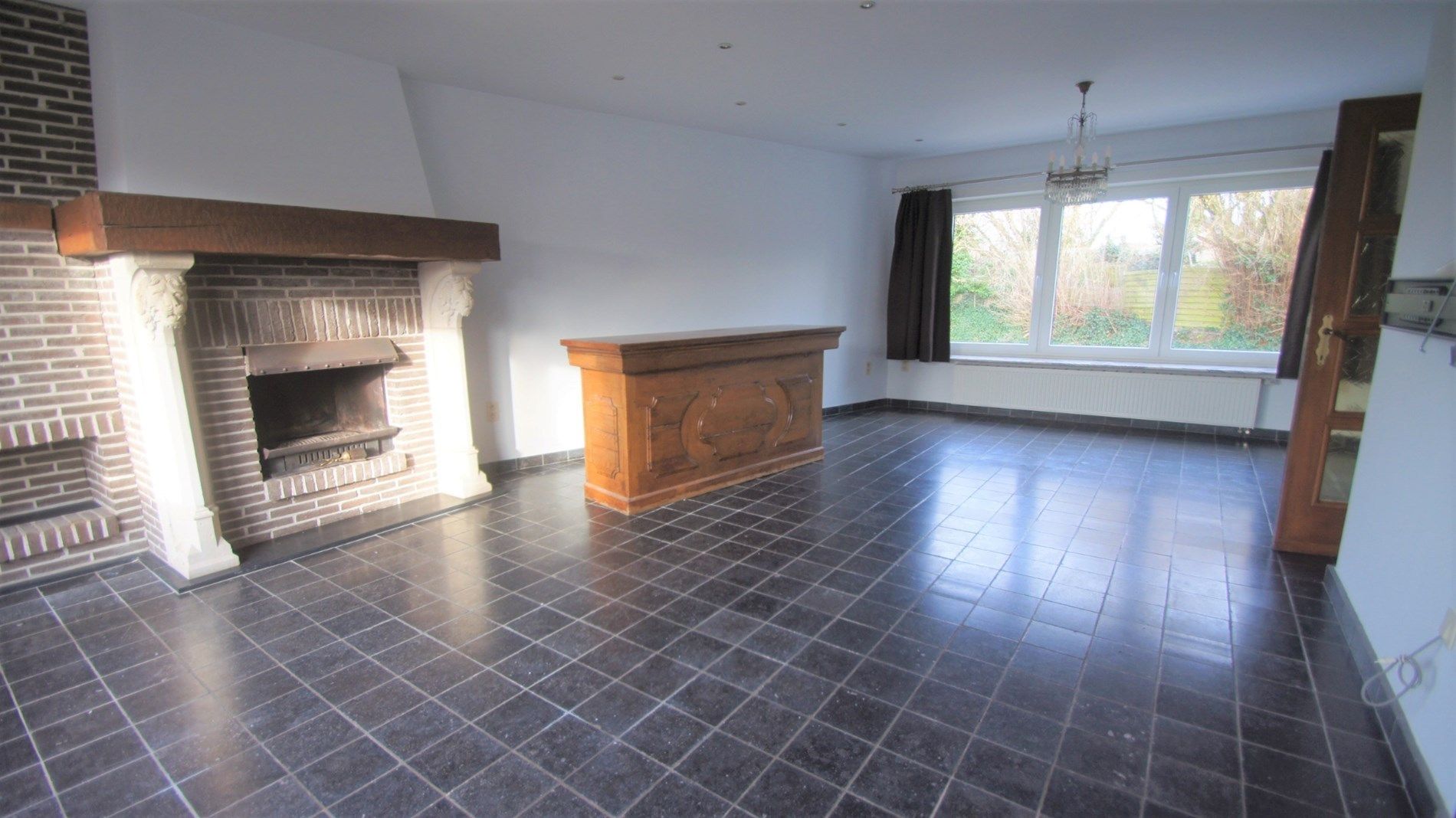 Mooi gelegen woning met tuin/terras, 2 slpks en garage foto 3