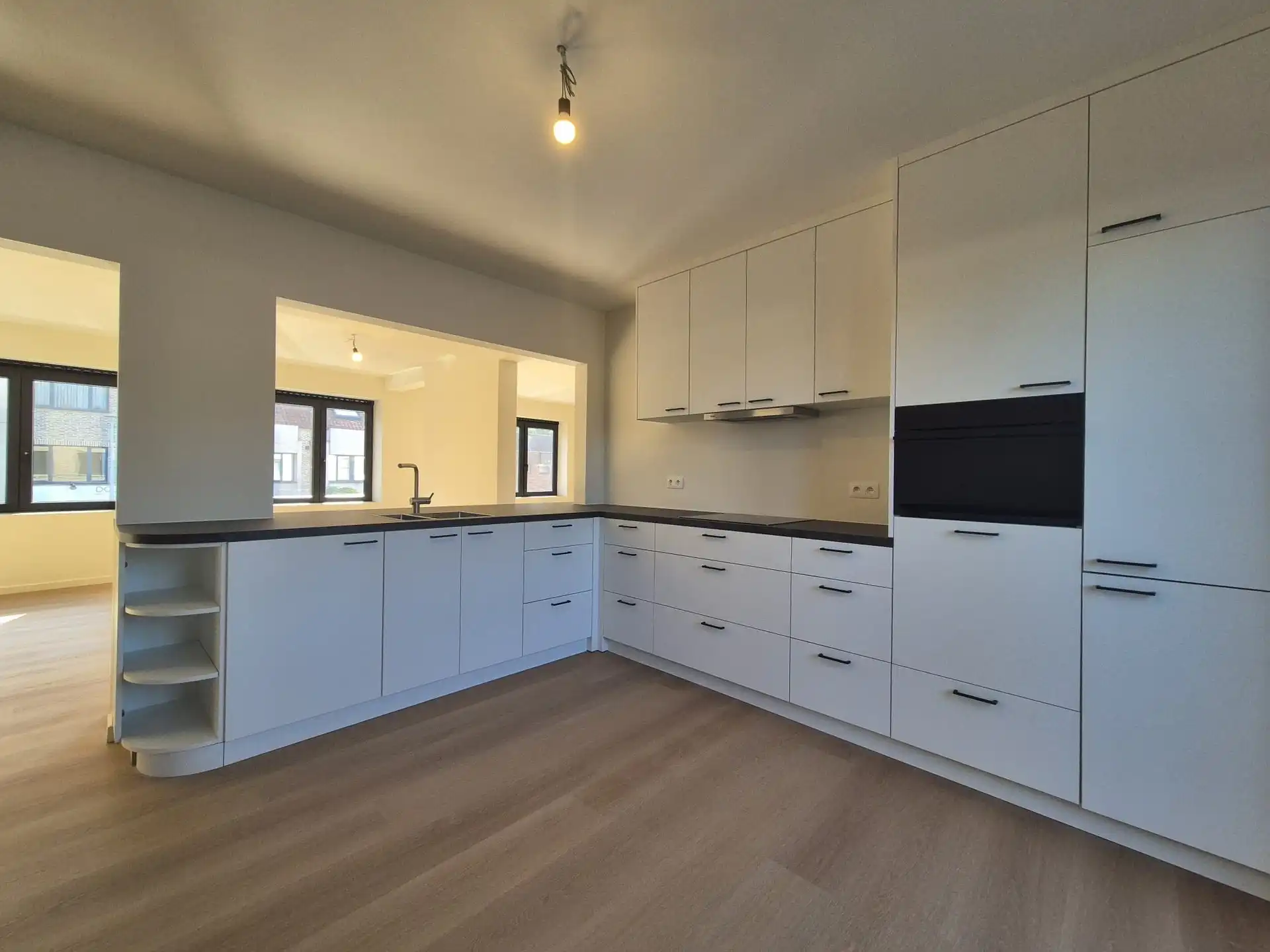 Ruim triplex appartement met polyvalente ruimte op toplocatie in het hart van Wetteren foto 11
