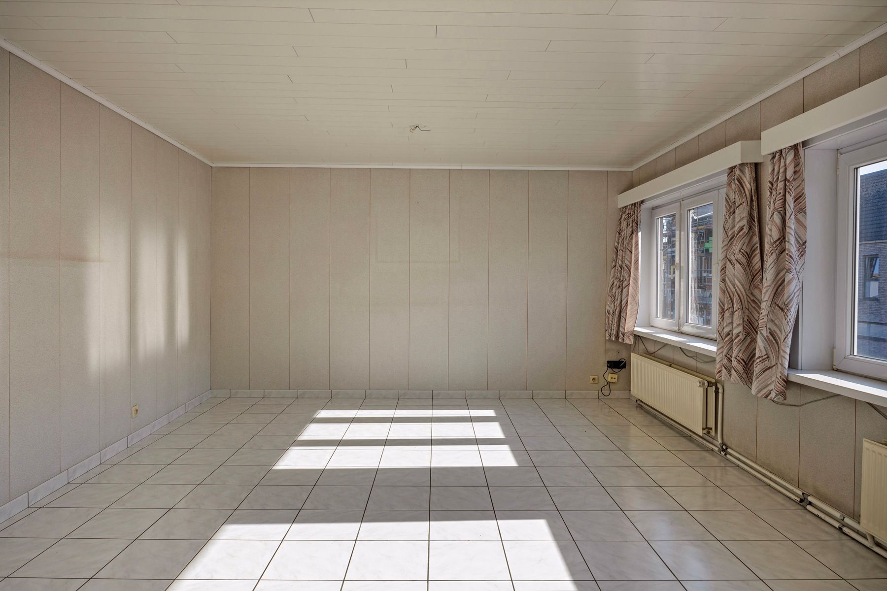 Handelshuis, ingedeeld als commerciële ruimte + appartement foto 14