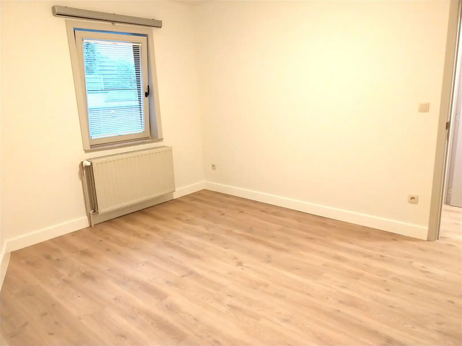 TE HUUR: Gelijkvloers appartement met 2 slaapkamers in het centrum van Zolder! foto 8