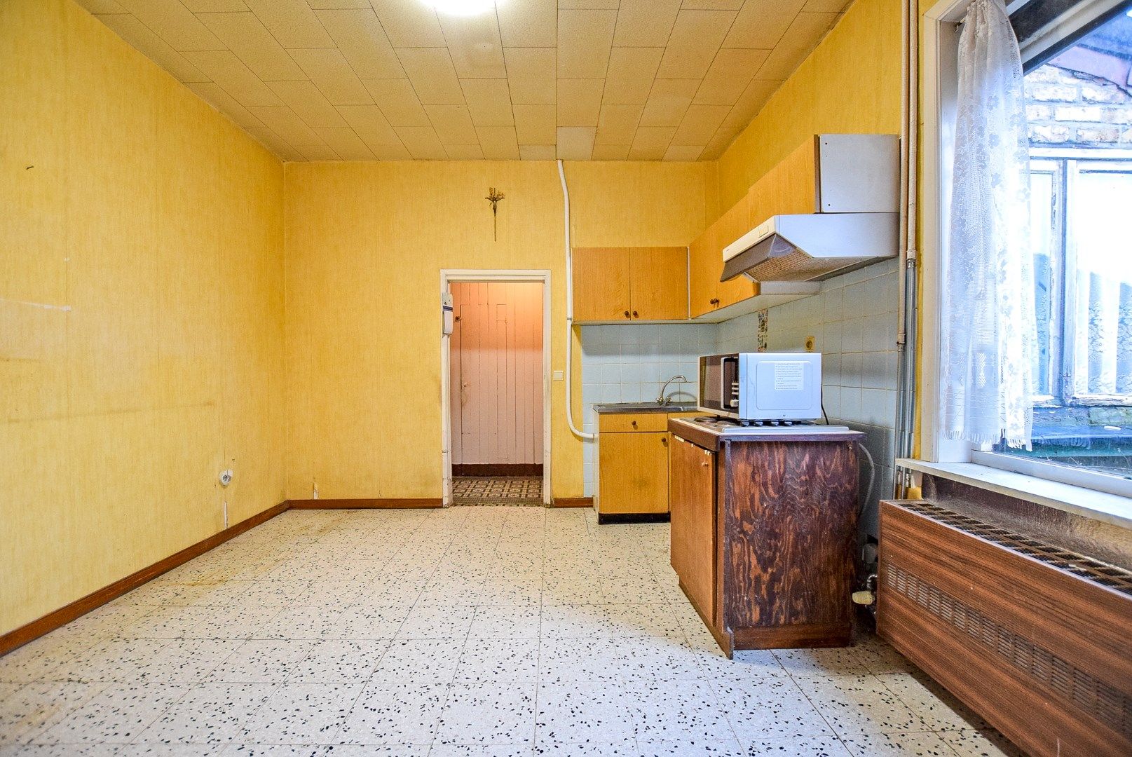 Gezellige woning te koop in Hoogstade met zongerichte tuin en zijtoegang. foto 10