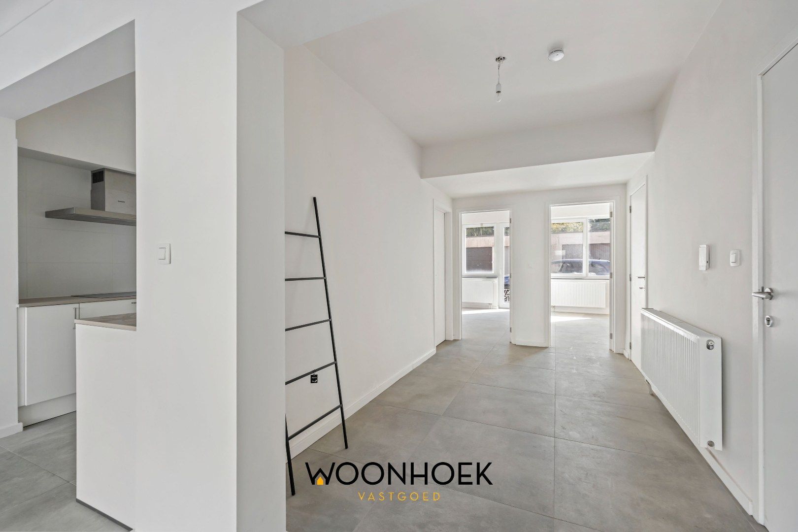 Gerenoveerd appartement op toplocatie te Belsele! foto 4