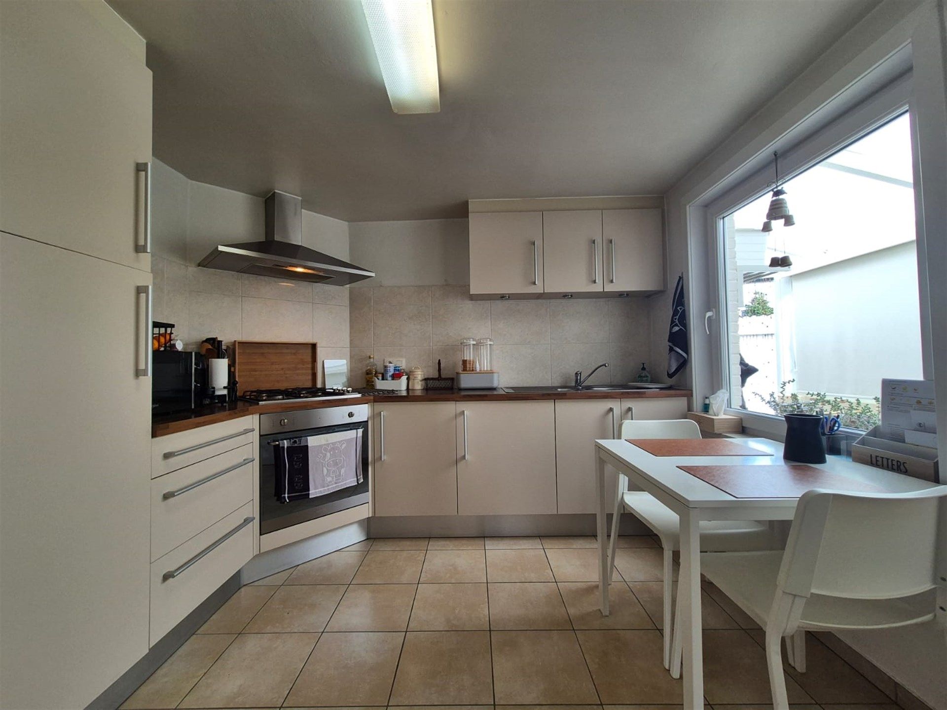 Knusse woning met tuin en garage.  foto 8