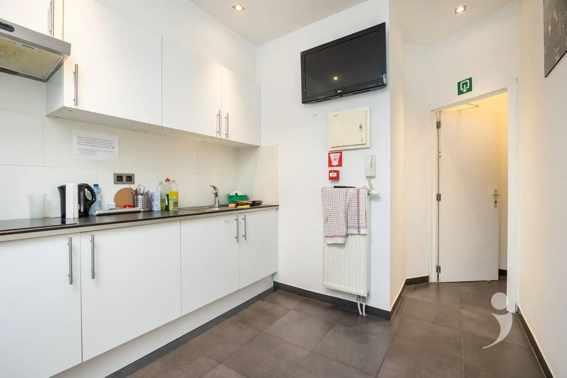 Opbrengsteigendom met handelspand, studio en 6 studentenkamers in Leuven foto 11