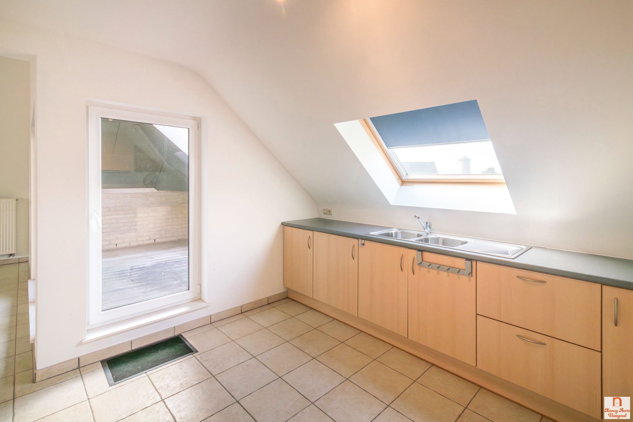 Appartement met autostaanplaats in hartje Koersel foto 11