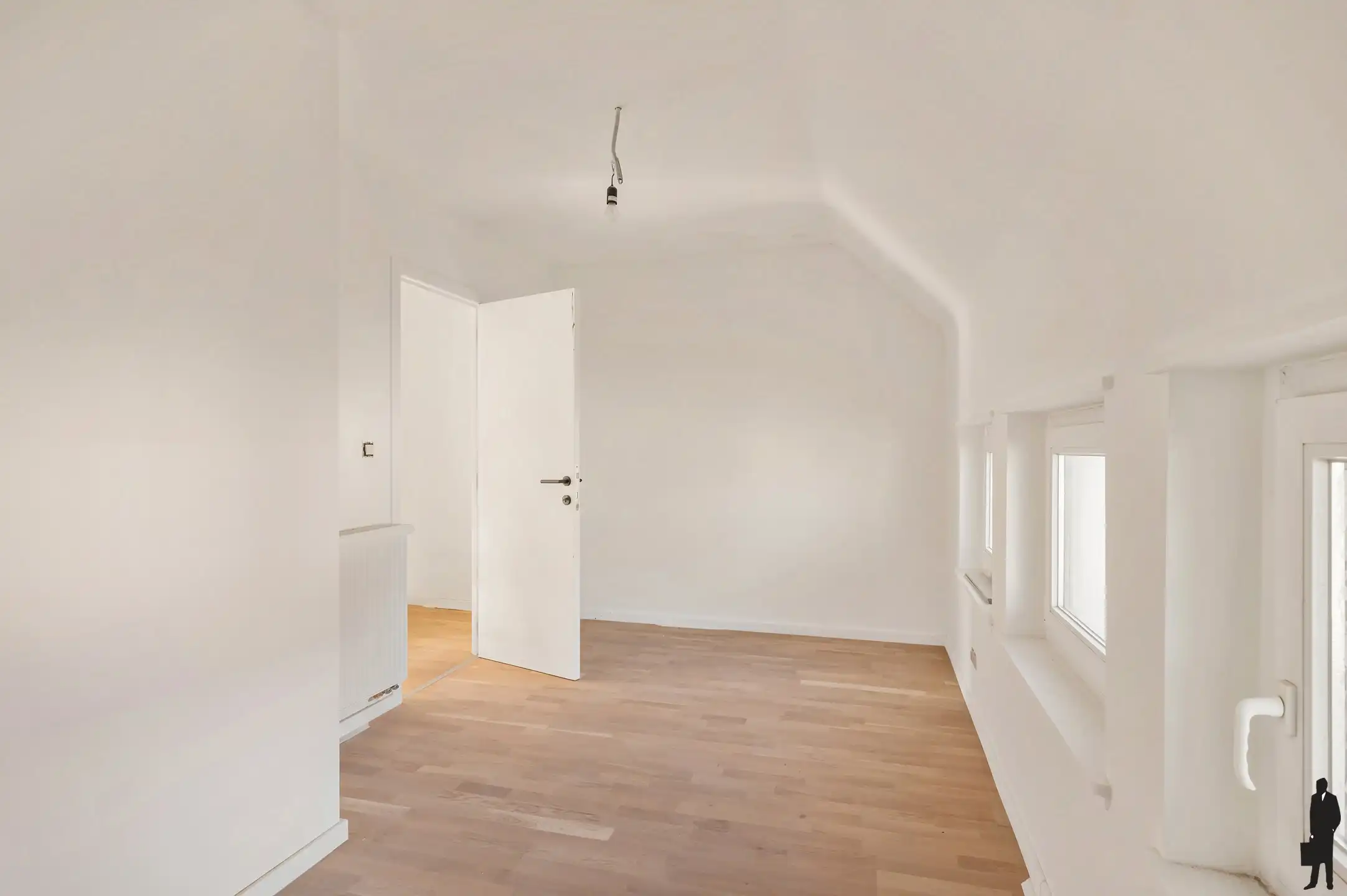 Handelsgelijkvloers met gerenoveerde triplex in het centrum! foto 17