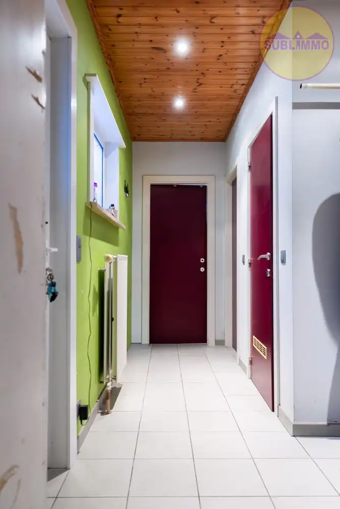 Handelspand met woonst + 4 garages in het centrum van Meerhout foto 2