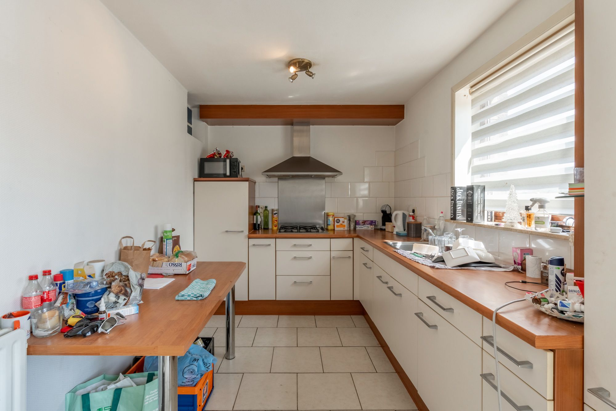 IDEALIS VASTGOED - APPARTEMENT OP 1ste  VERDIEP MET RUIM 80M² BEWOONBARE OPPERVLAKTE, 2 SLAAPKAMERS EN INPANDIGE GARAGE IN HET HARTJE VAN BOCHOLT foto 7