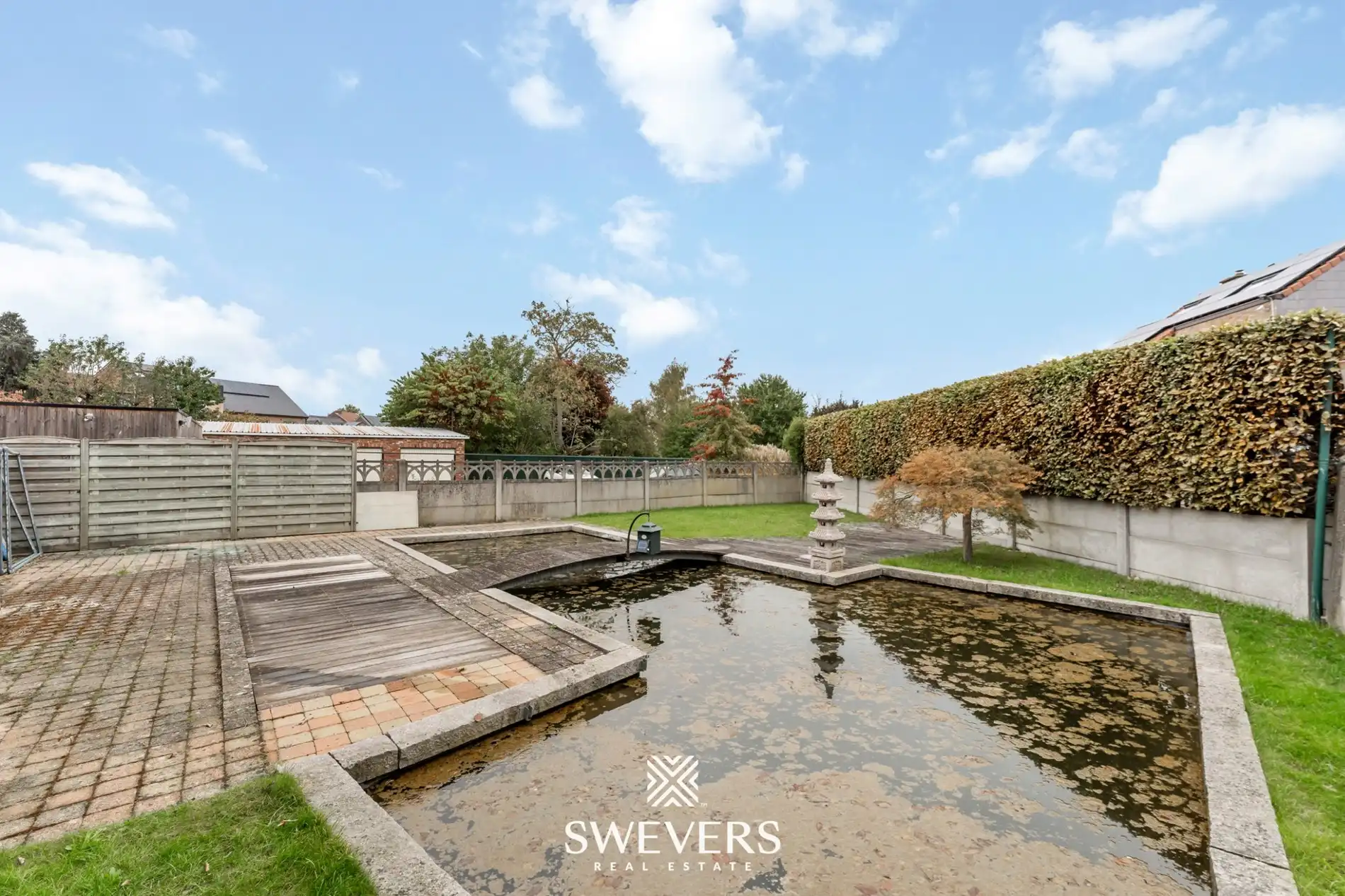 Instapklaar handelspand met woonst en tuin in Herk-de-Stad foto 22