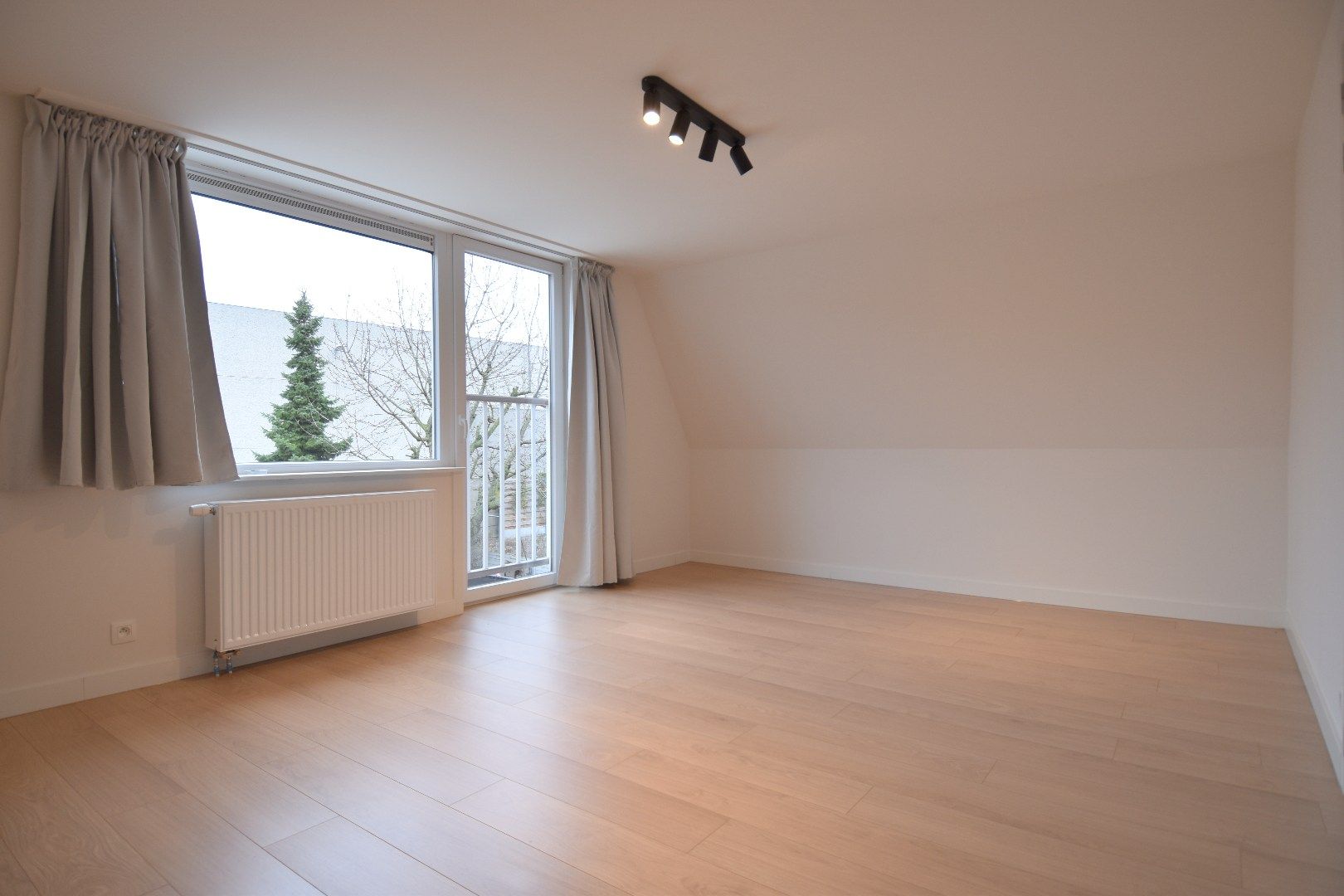 Gerenoveerde woning met tuin en 3 slaapkamers in Kortrijk foto 10