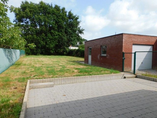Gezinswoning met 3 slaapkamers, garage en tuin  foto 14