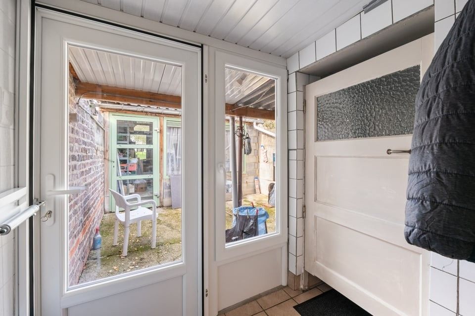 TE RENOVEREN STADSWONING VLAKBIJ HET CENTRUM VAN SINT-TRUIDEN foto 11