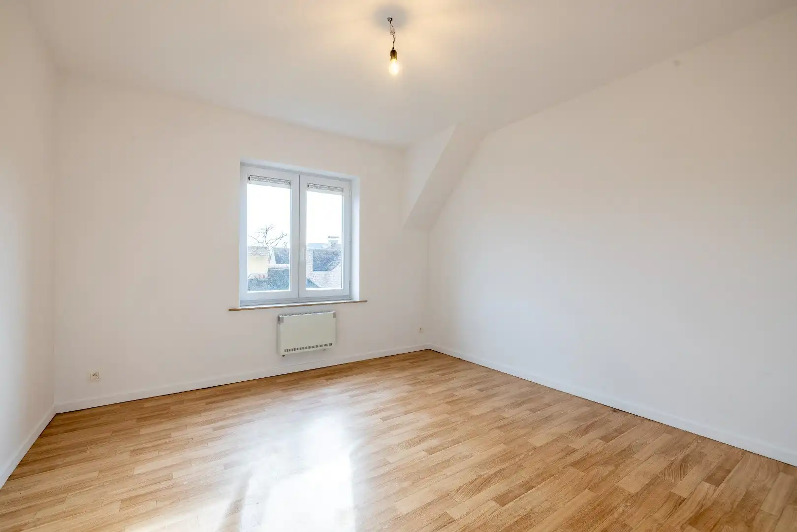 Instapklaar 3-slaapkamerappartement met autostaanplaats – ideaal als investering of eigen woonst foto 7