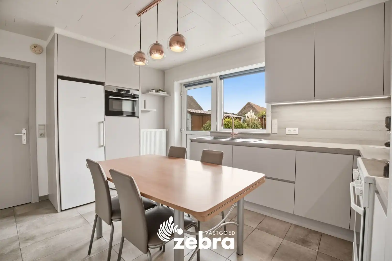 Woning met 3 slaapkamers en gezellige tuin te Tielt! foto 9