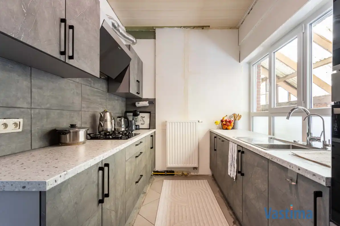 Rustig gelegen gezinswoning met tuin foto 9