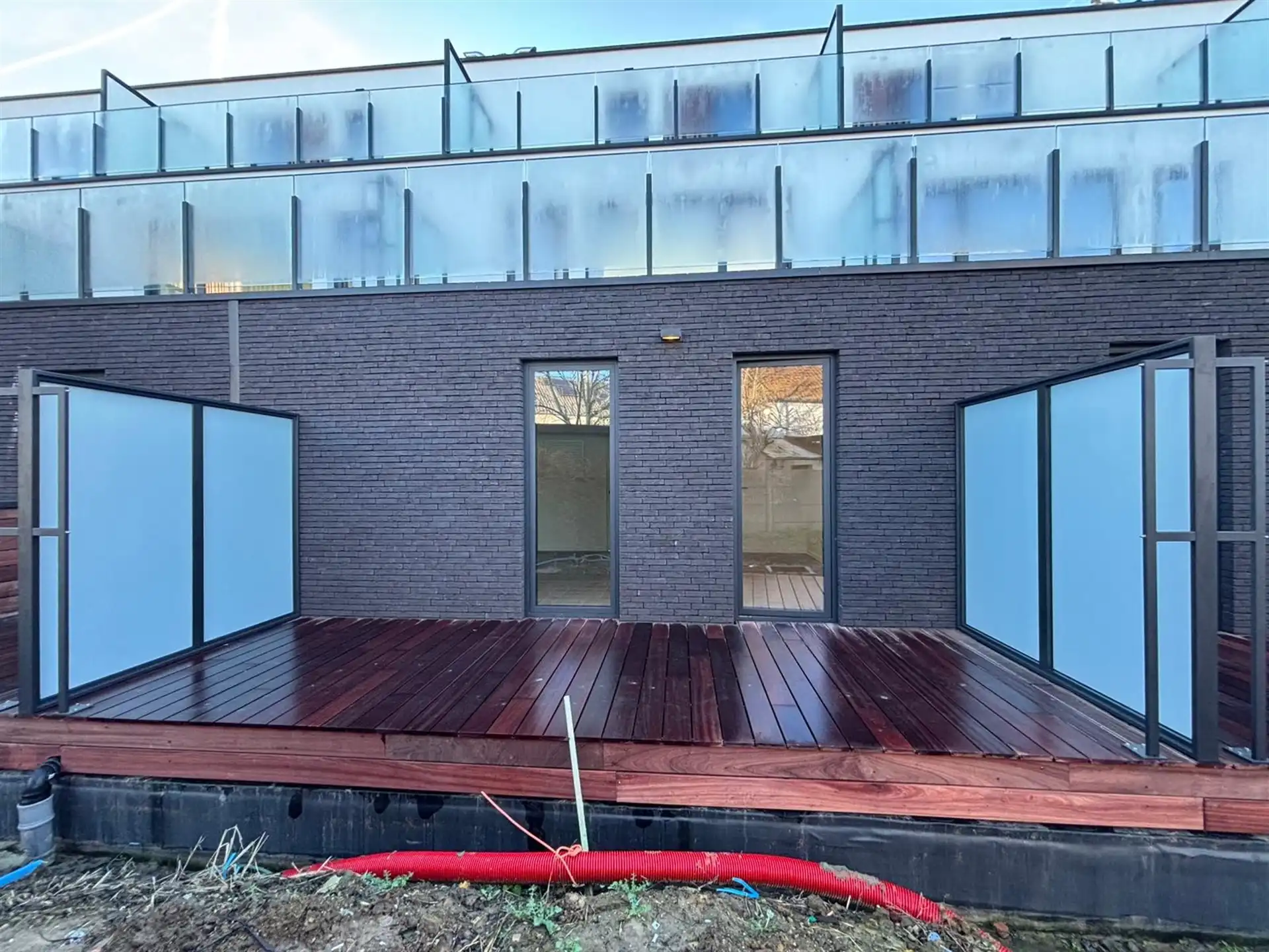 Modern gelijkvloers appartement met private tuin en ruime terrassen in Asse! foto 3