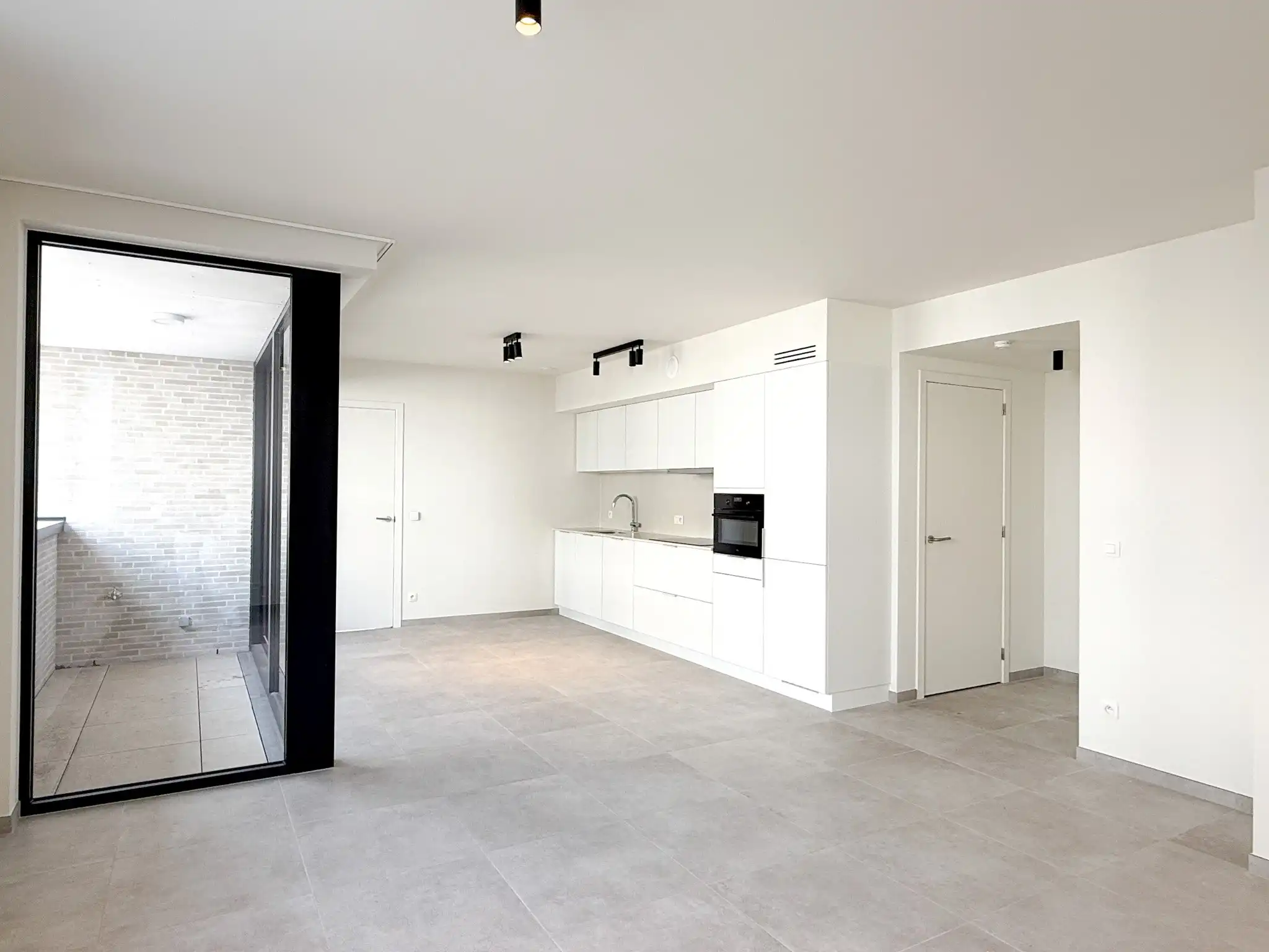 Gelijkvloers nieuwbouwappartement met terras en 1 slaapkamers foto 2