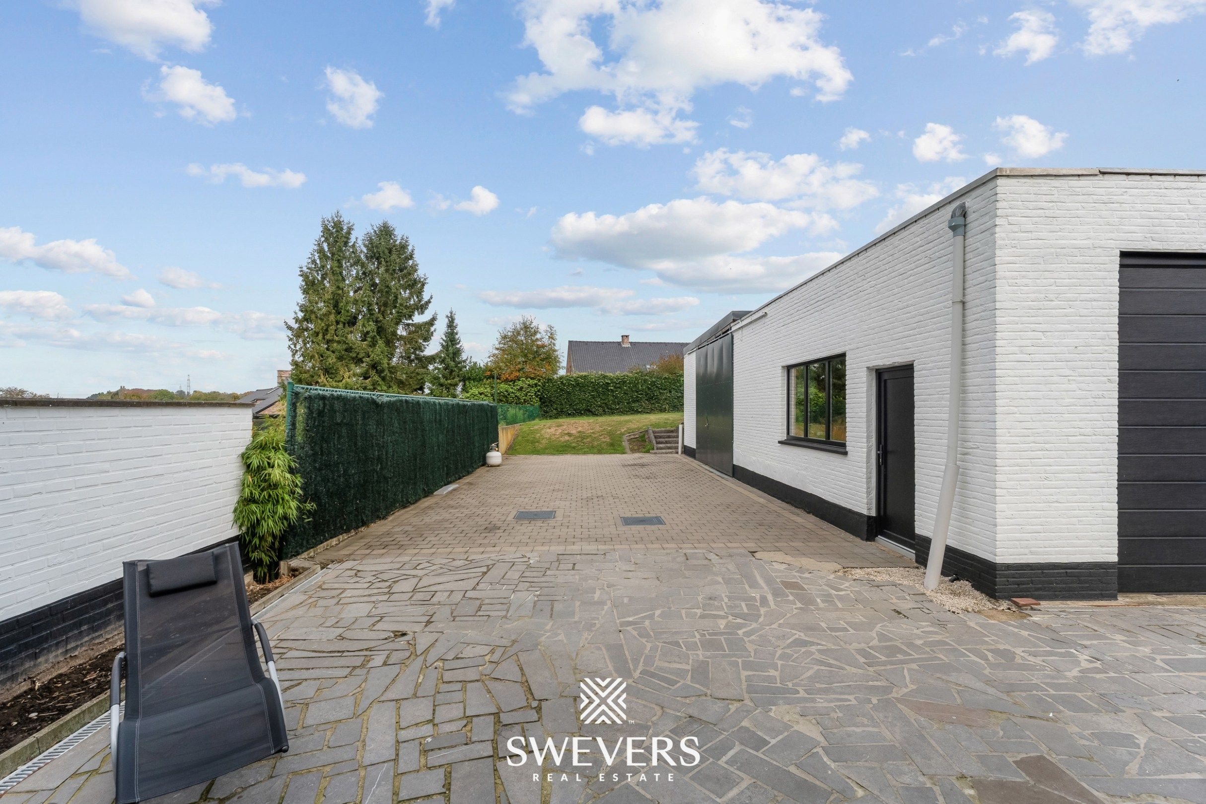 Volledig vernieuwd pareltje met terras, balkon & loods in Riemst foto 25