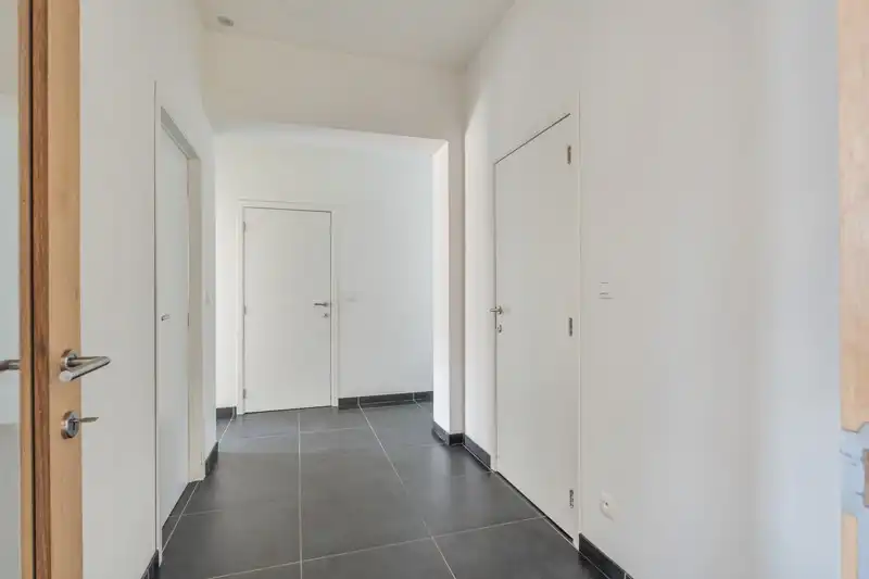 Gelijkvloers appartement met 2 slaapkamers, autostaanplaats en terras foto 9