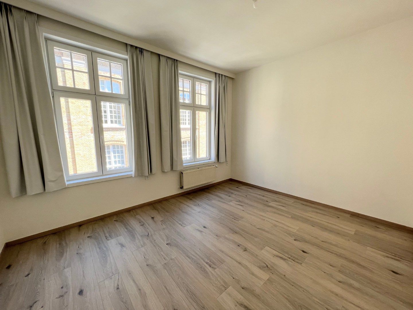 GERENOVEERDE STADSWONING IN CENTRUM IEPER MET 3 SLPKS EN ZONNIG TERRAS foto 11