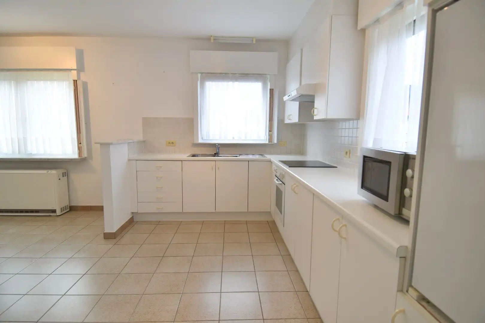 Verzorgde halfopen woning dichtbij het centrum van Heule foto 5