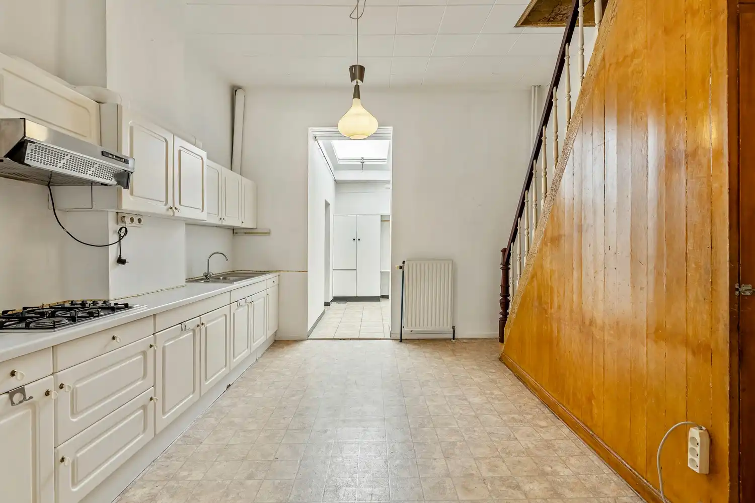 Goed gelegen rijwoning met 2 slaapkamers en een af te werken zolderruimte te Leuven! foto 5