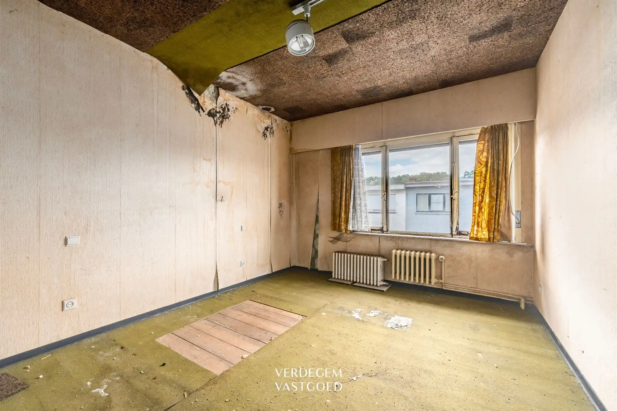 Renovatieproject: centraal gelegen handelspand met woonst en tuin foto 14