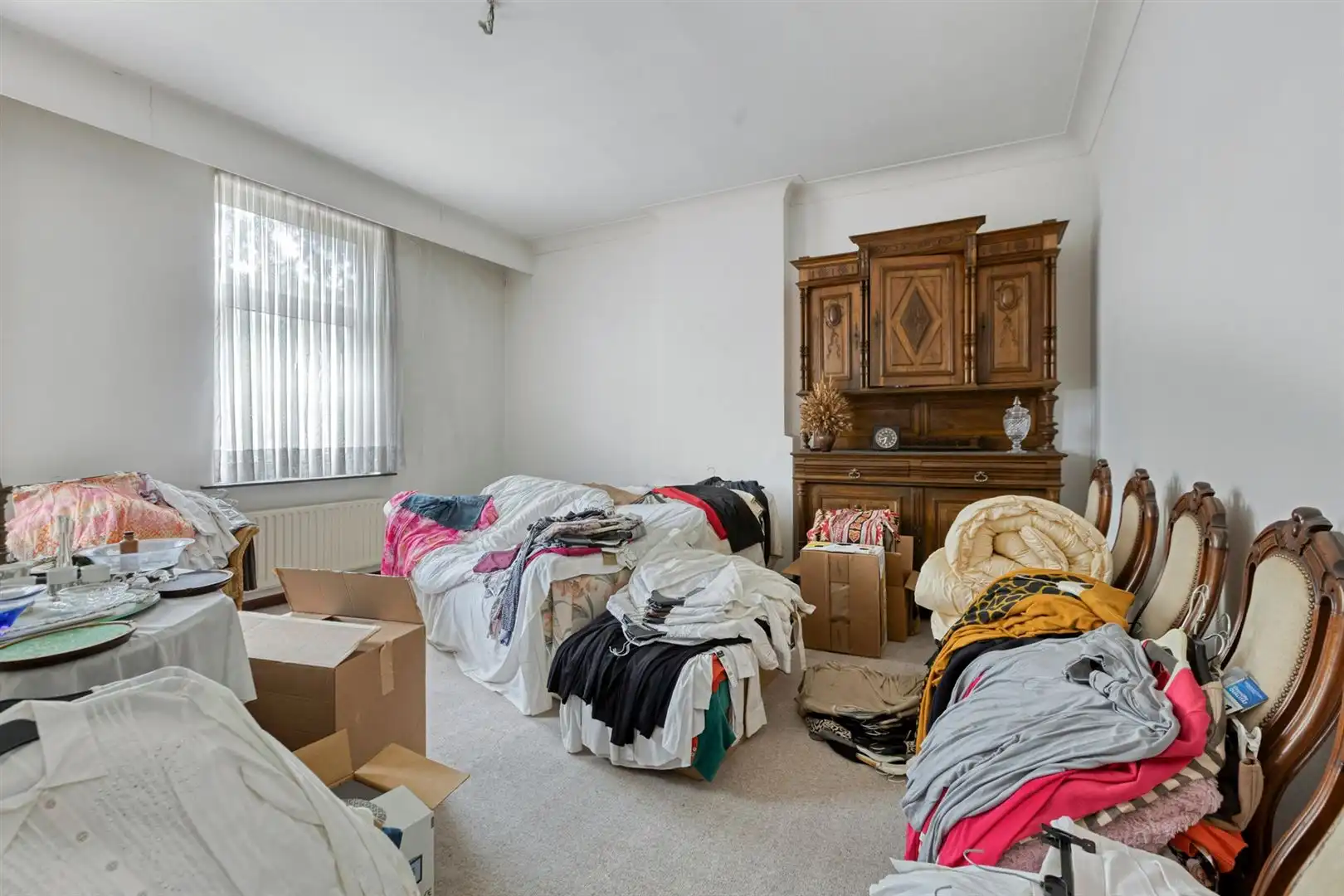 TE KOOP: Handelshuis met ruime woonst in het centrum van Leopoldsburg! foto 16