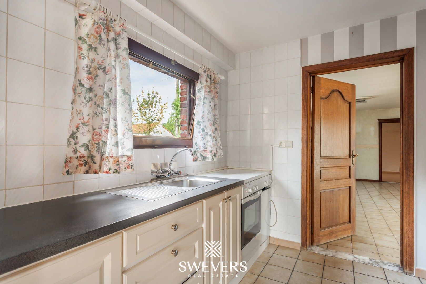 Te renoveren woning met veel potentieel op toplocatie te Diepenbeek foto 9