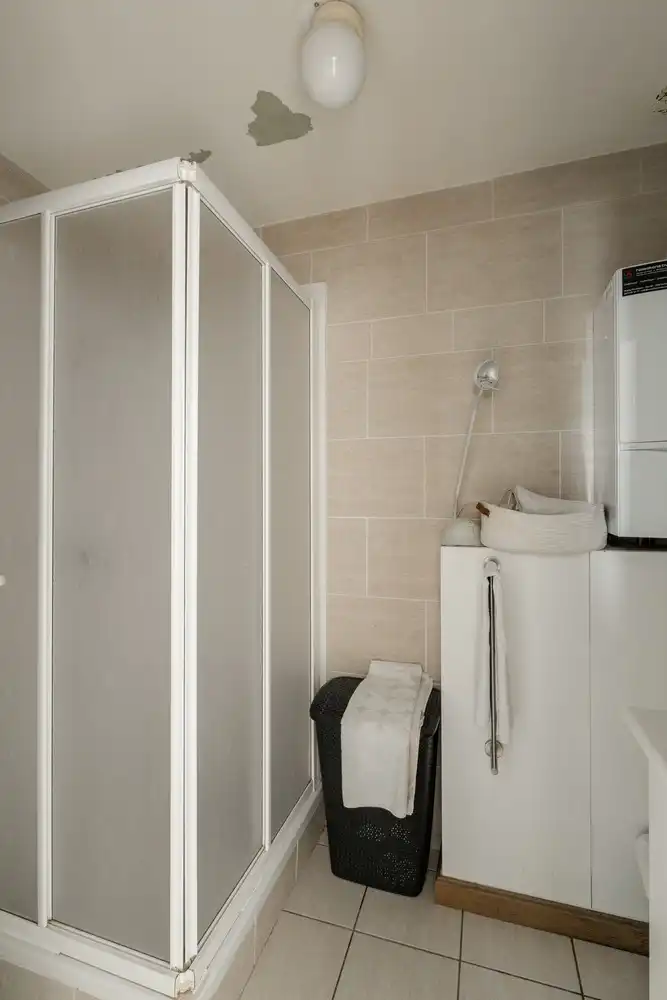 Lichtrijk instapklaar duplexappartement met 2 slaapkamers en ondergrondse parking foto 17
