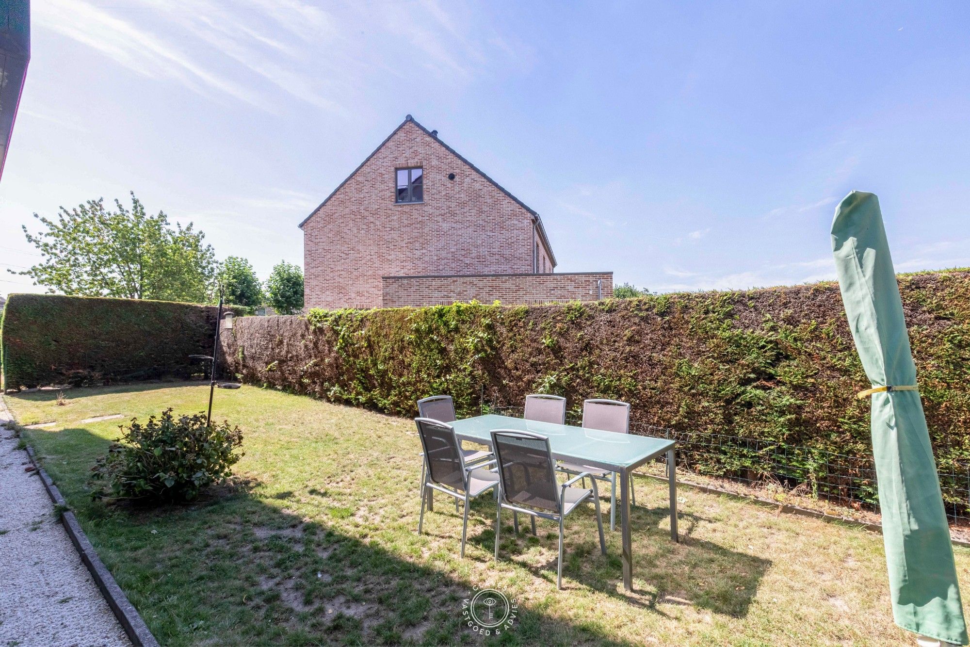Ruim gelijkvloers appartement met tuin foto 15