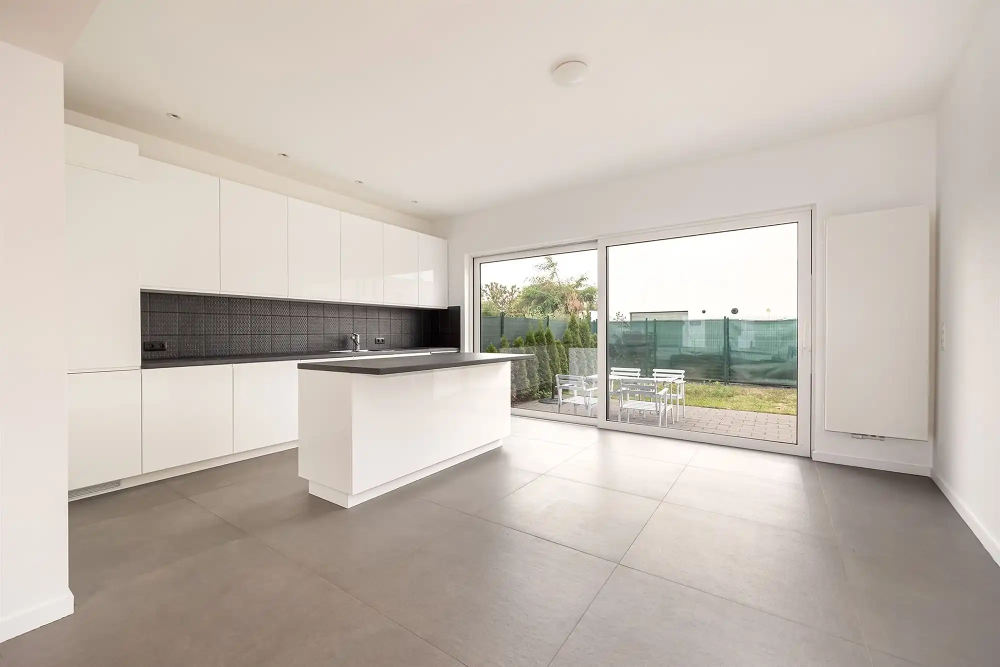 Ruime, energiezuinige woning met tuin in Rumst foto 3