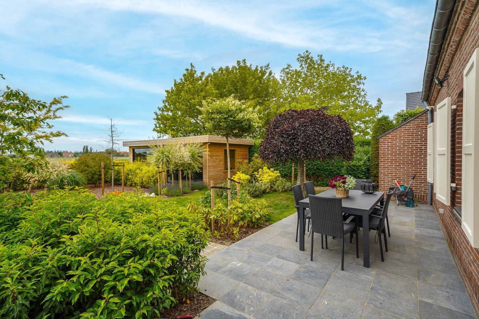 Instapklare laagbouwvilla met 305 m² woonoppervlakte en prachtig aangelegde tuin foto 15