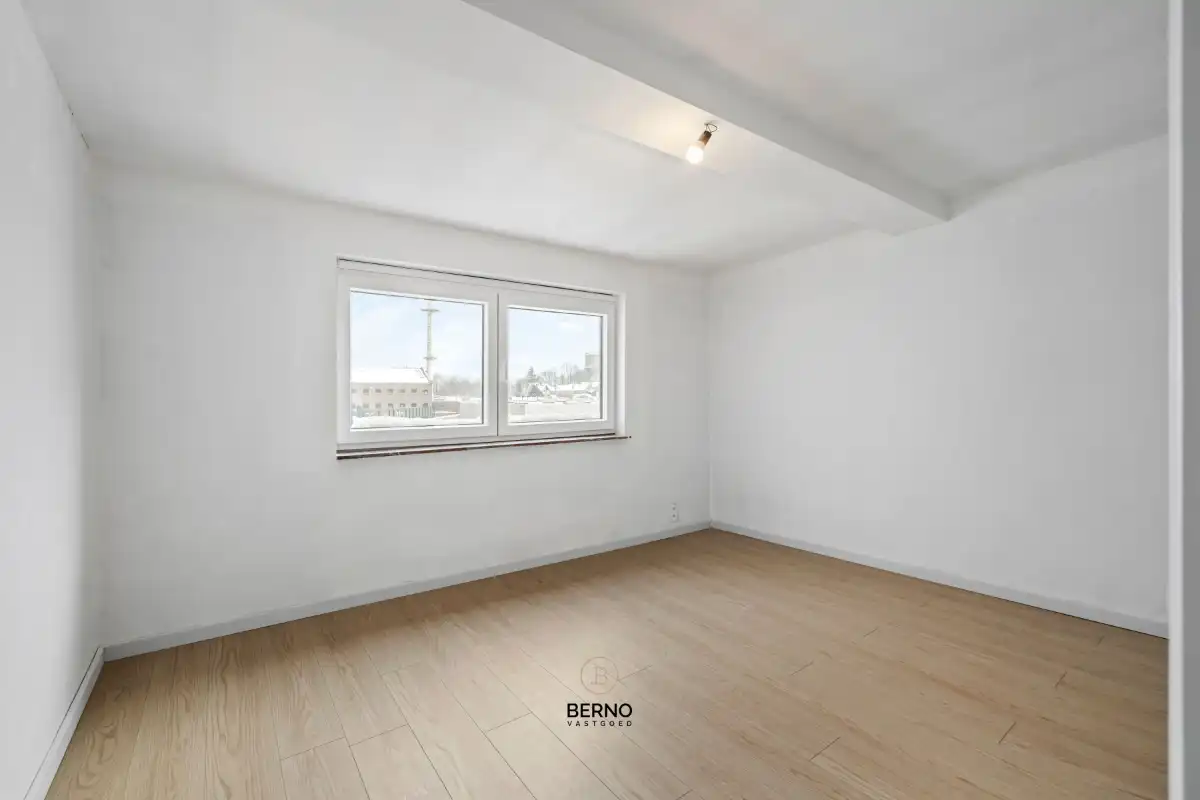 Gerenoveerde handelswoning met tuin foto 11