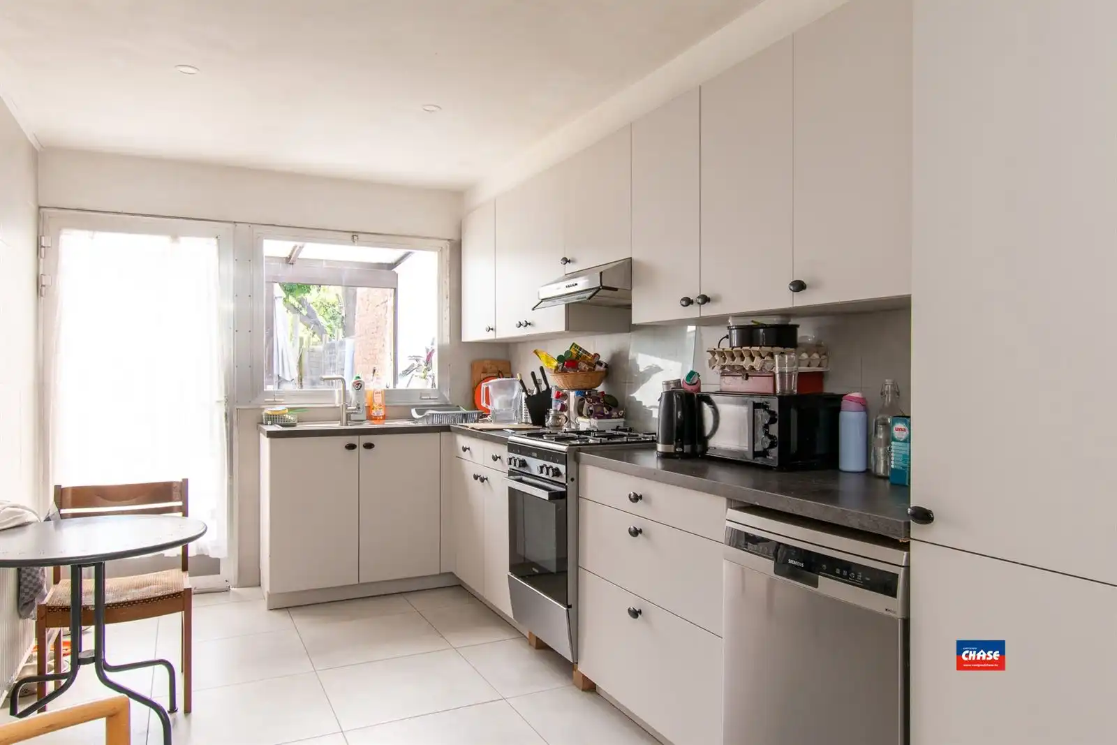 Op te frissen woning met 3 slpks, zolder en tuin foto 5