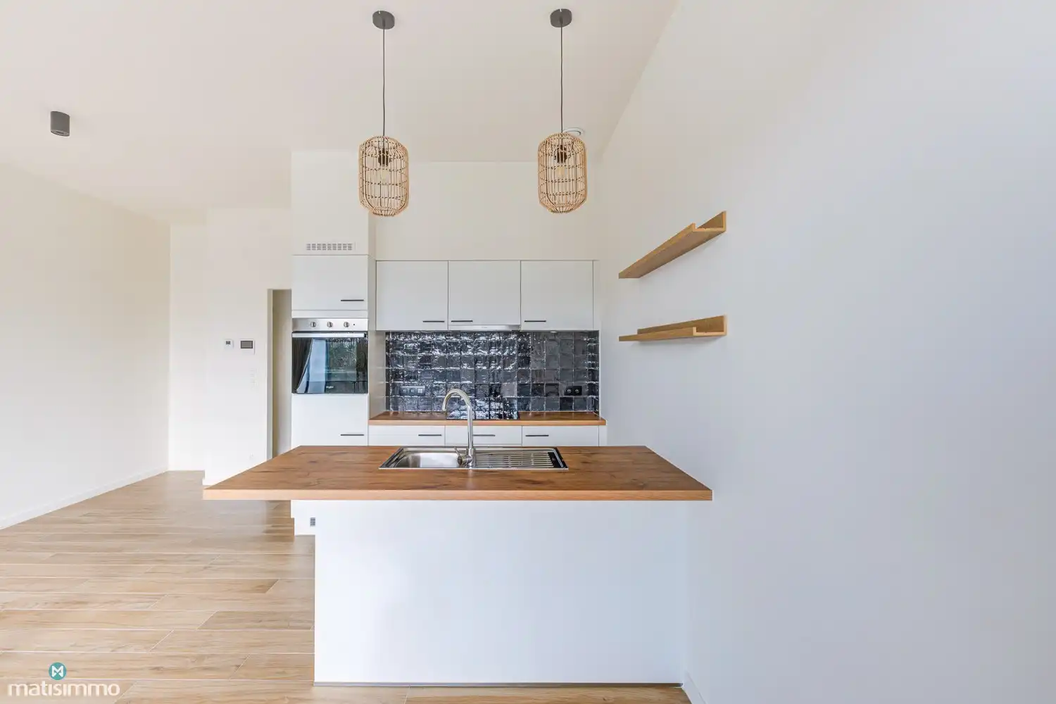 GELIJKSVLOERS APPARTEMENT MET ZUIDGERICHT TERRAS GELEGEN NABIJ HET CENTRUM VAN BILZEN foto 7