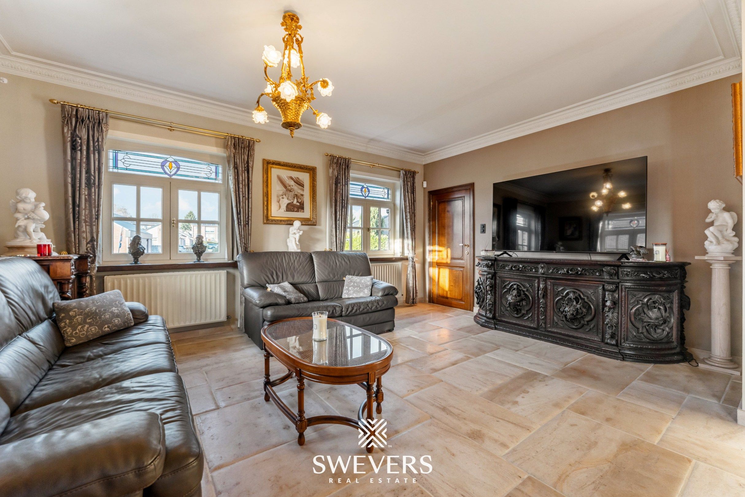 Ruime open bebouwing met 4 slaapkamers en zonnige tuin in Houthalen foto 2