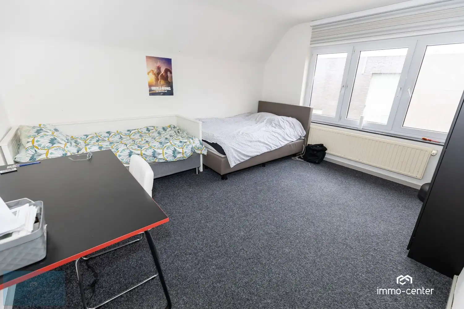 Ruime open bebouwing met westgerichte tuin in Genk foto 24