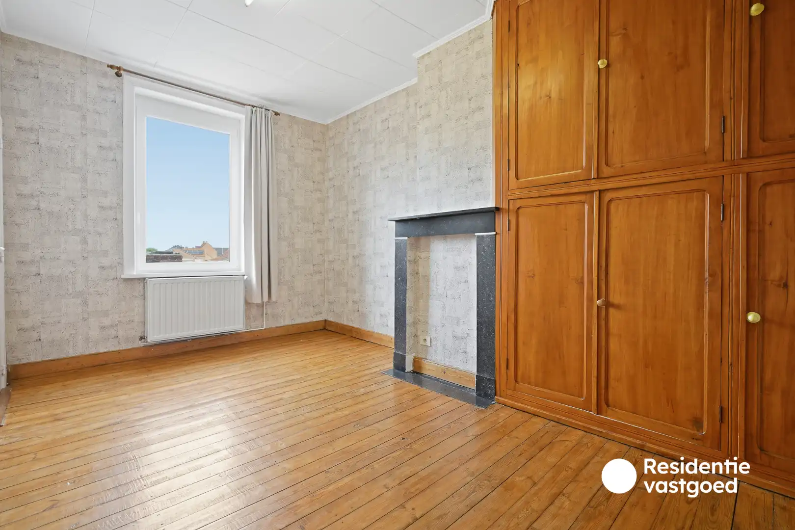 Veelzijdig eigendom met handelsruimte, ruime woning en bouwgrond in centrum Merkem! foto 15