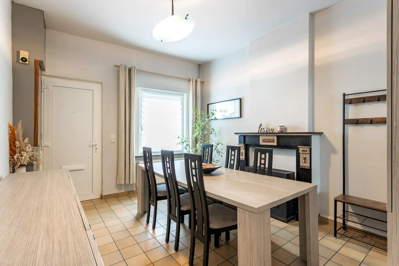 Energiezuinige woning met 2 slpk + zolder en tuin foto 2