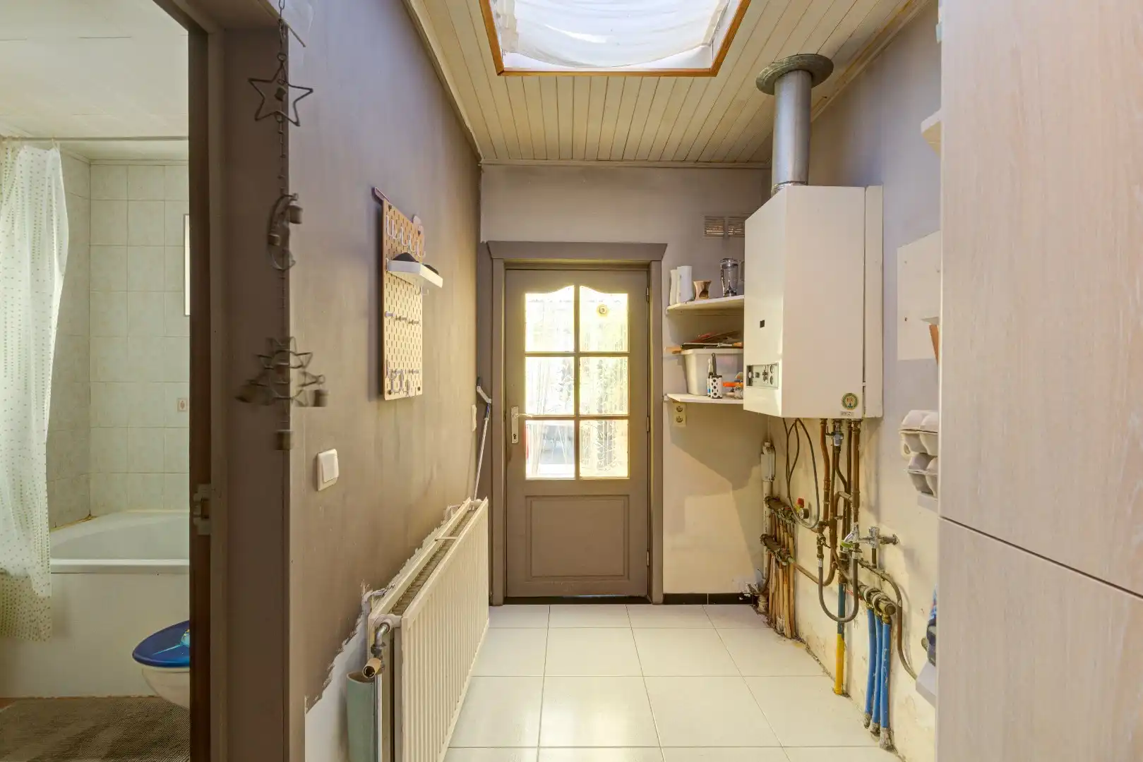 Op te frissen woning, 3 slaapkamers en grote tuin. foto 7