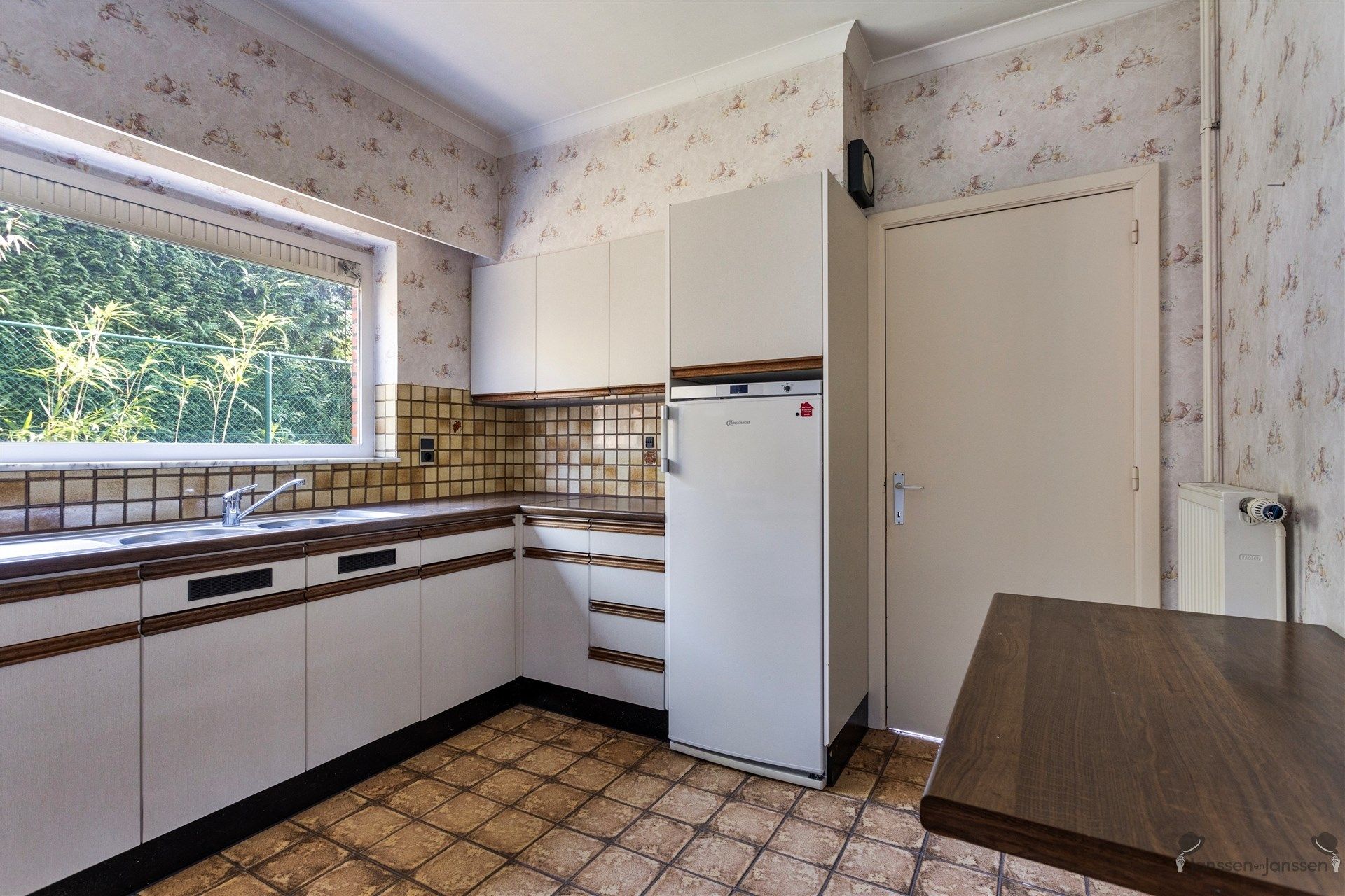 Karaktervolle woning met veel potentieel in het groene Sterrebos!  foto 9