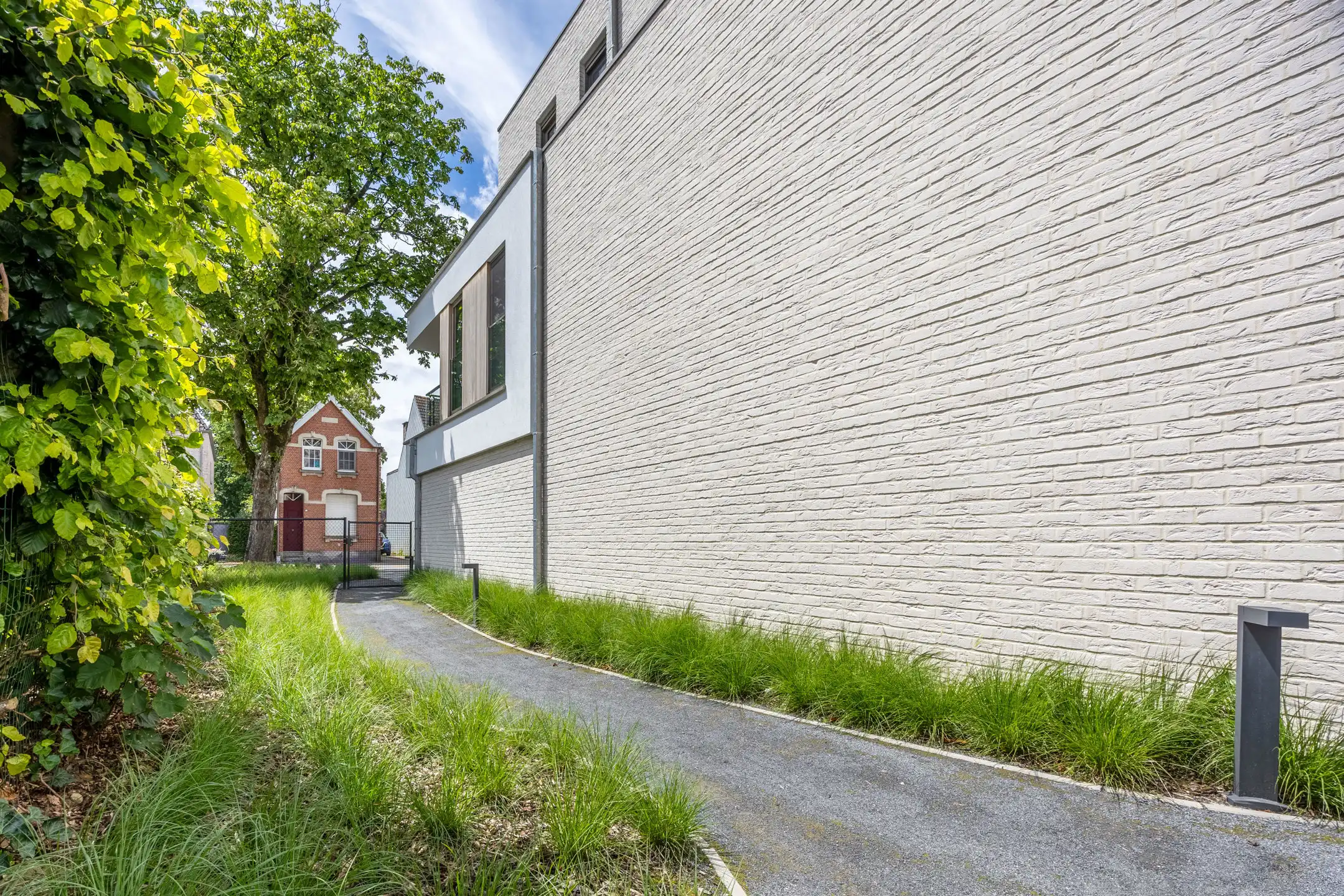 Stijlvol gelijkvloers appartement met tuin foto 20