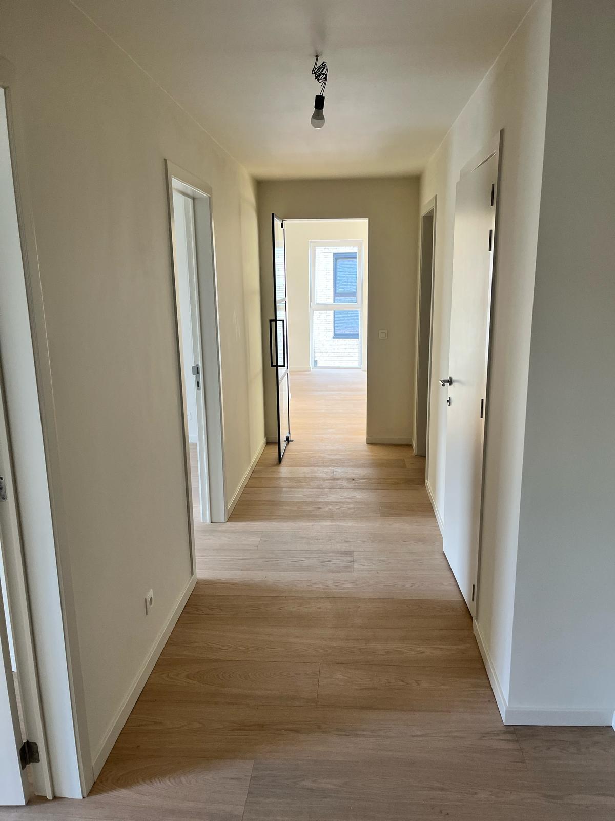 Luxueus nieuwbouw appartement met terras te Molenbeersel. foto {{pictureIndex}}