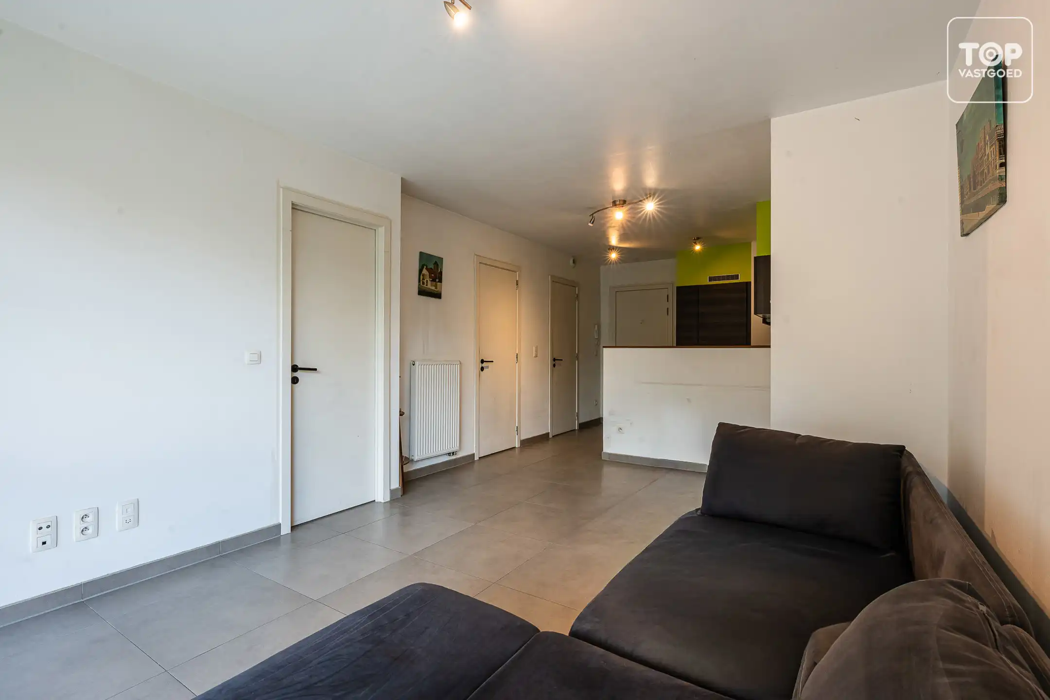 lichtrijk appartement met 1 slaapkamer en groene tuin foto 10