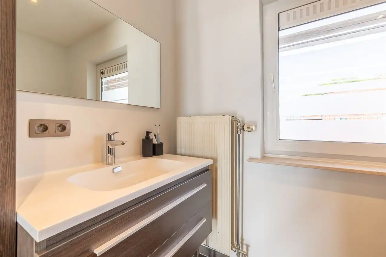 Appartement met twee slaapkamers, terras en autostaanplaats te midden van centrum foto 13