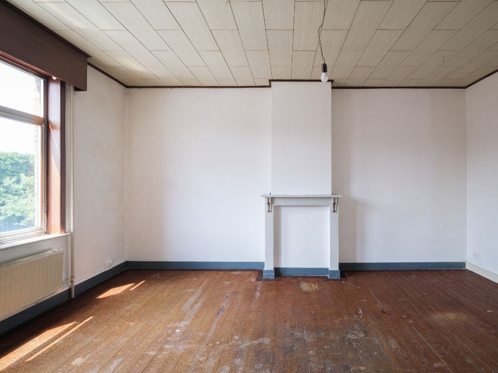 Atelier/loods met te renoveren woning, ruime tuin en bijzonder veel potentieel op een boogscheut van het stadscentrum. foto 14